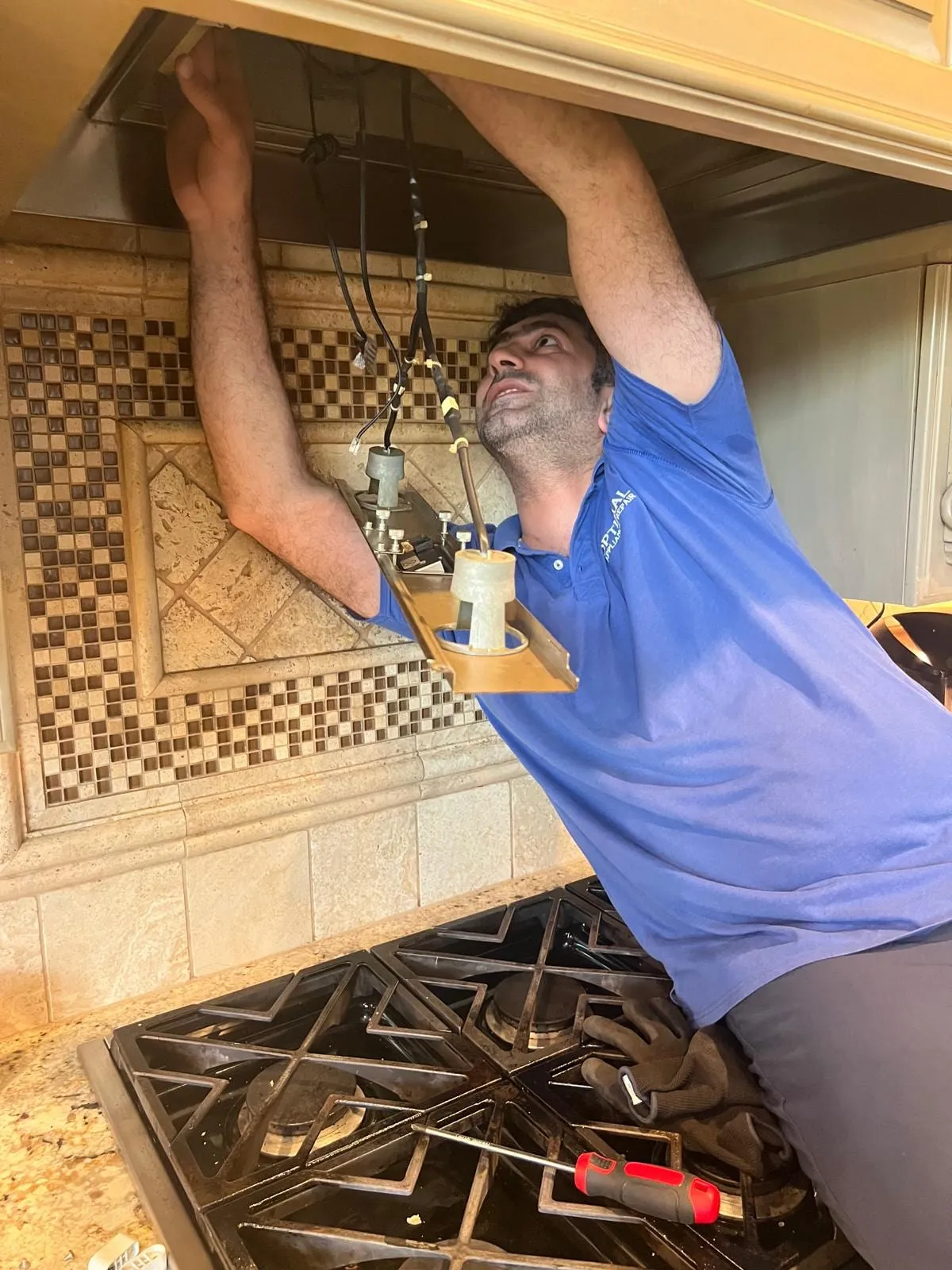 Vent hood repair, by an Optimal Appliance technician